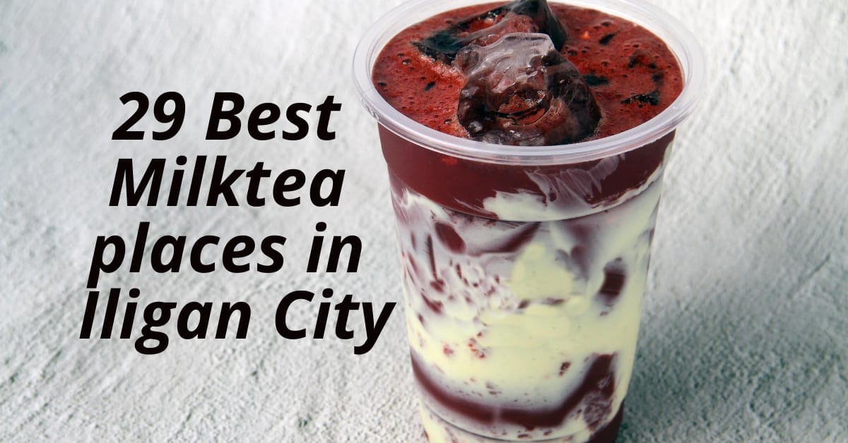 Clear cup of milk tea on textured background: 29 Best Milktea Places in Iligan City from the Iligan website.