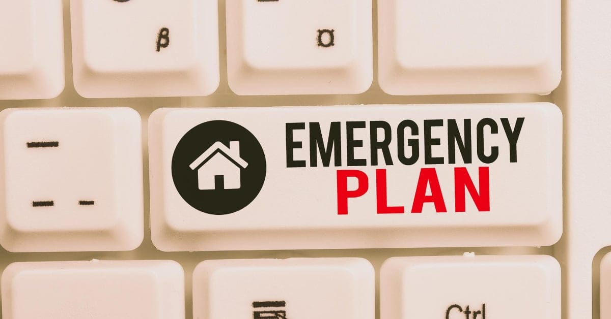 White keyboard with a key showing a house icon and text: Emergency Plan in black and red, ideal for Iligan City.