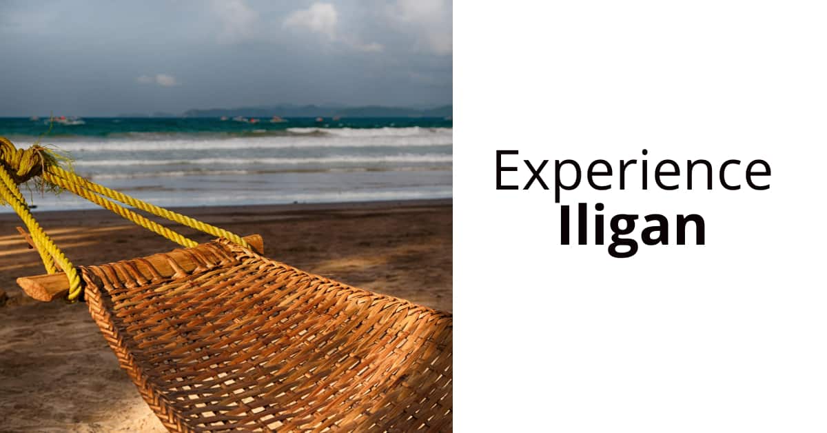 Woven hammock on a beach with text Experience Iligan City beside it.