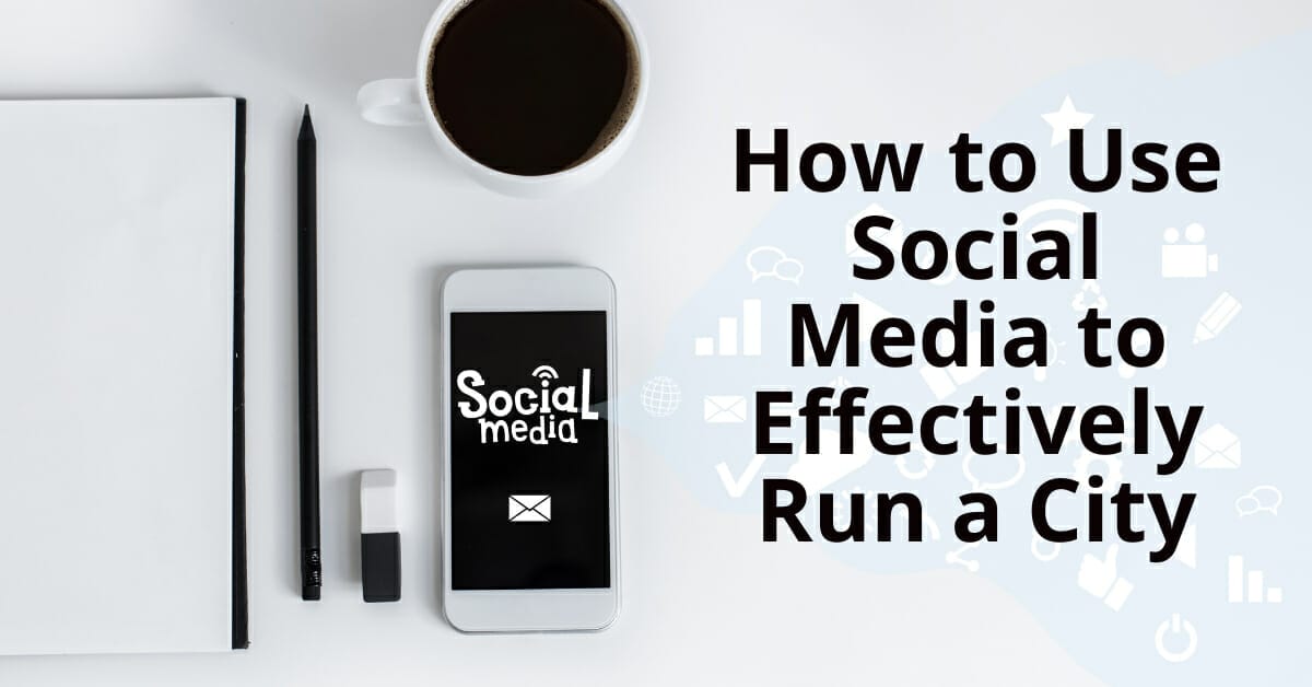 On a desk with coffee, notebook, pencil, and phone sits a text on How to Use Social Media to Run Iligan City Effectively.